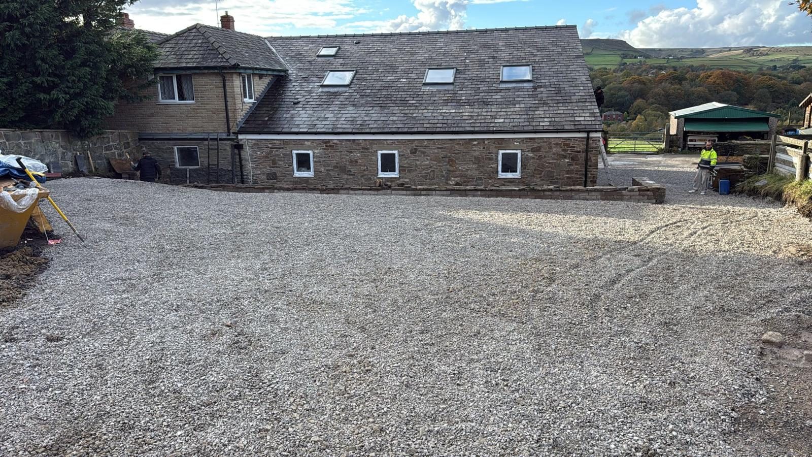 Finished stone barn conversion exterior with slate roof in Edenfield