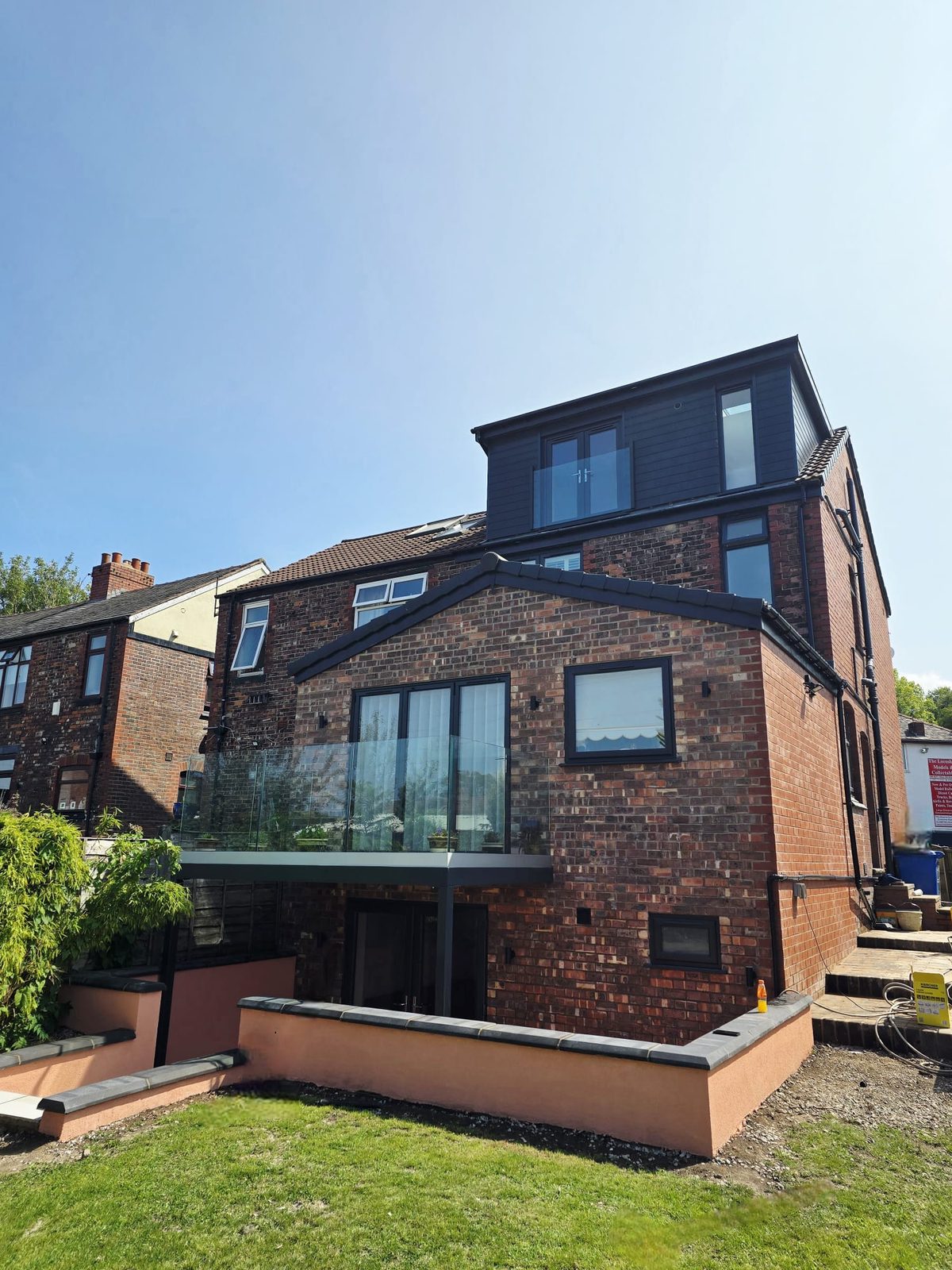 Completed double storey extension and dormer conversion in Whitefield